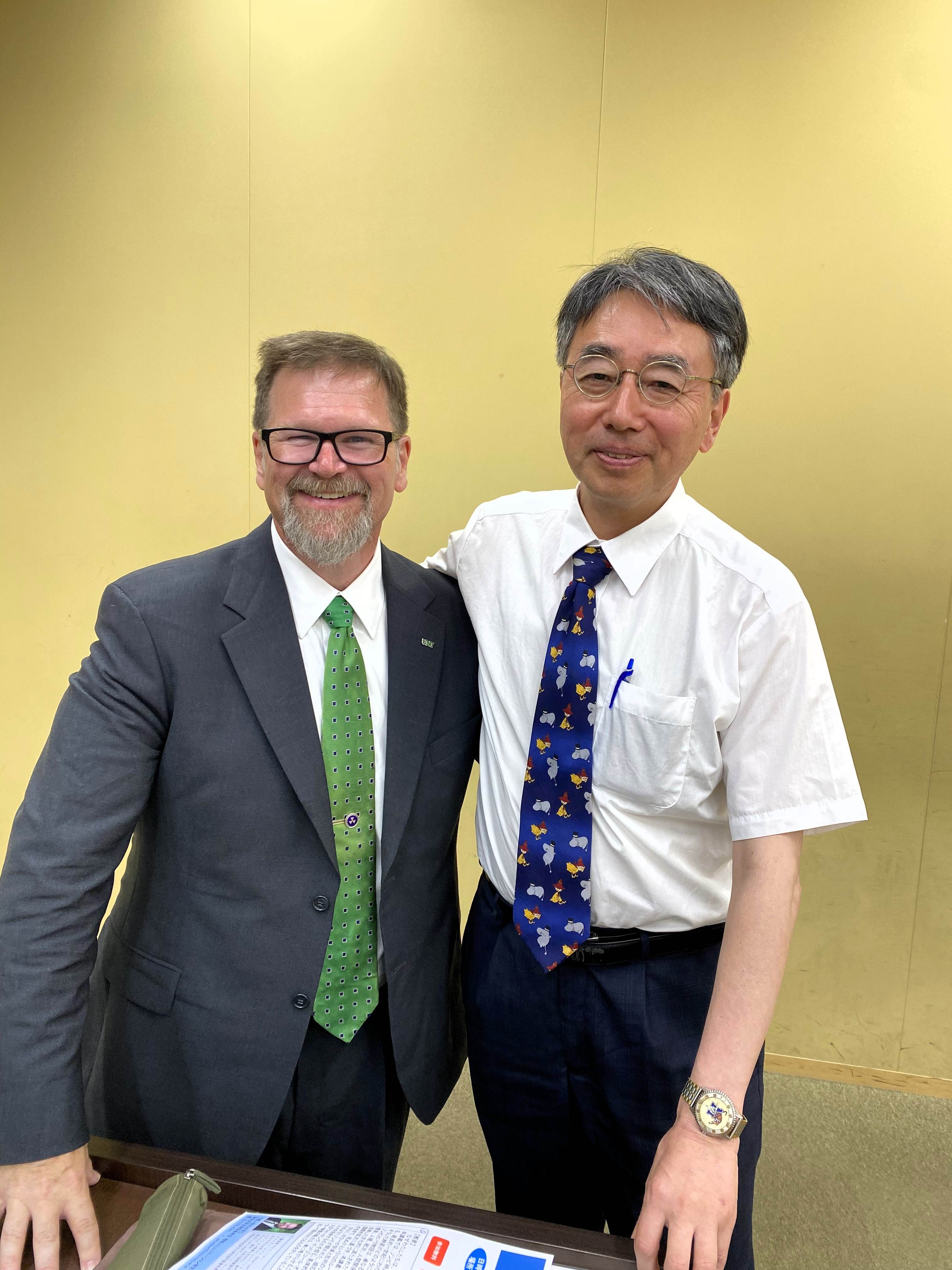Dr. Lain poses with Dr. Takeshi Suzuki