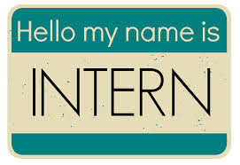 Hello my name is badge that says INTERN