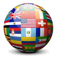 An artistic version of the globe covered in flags countries around the world.