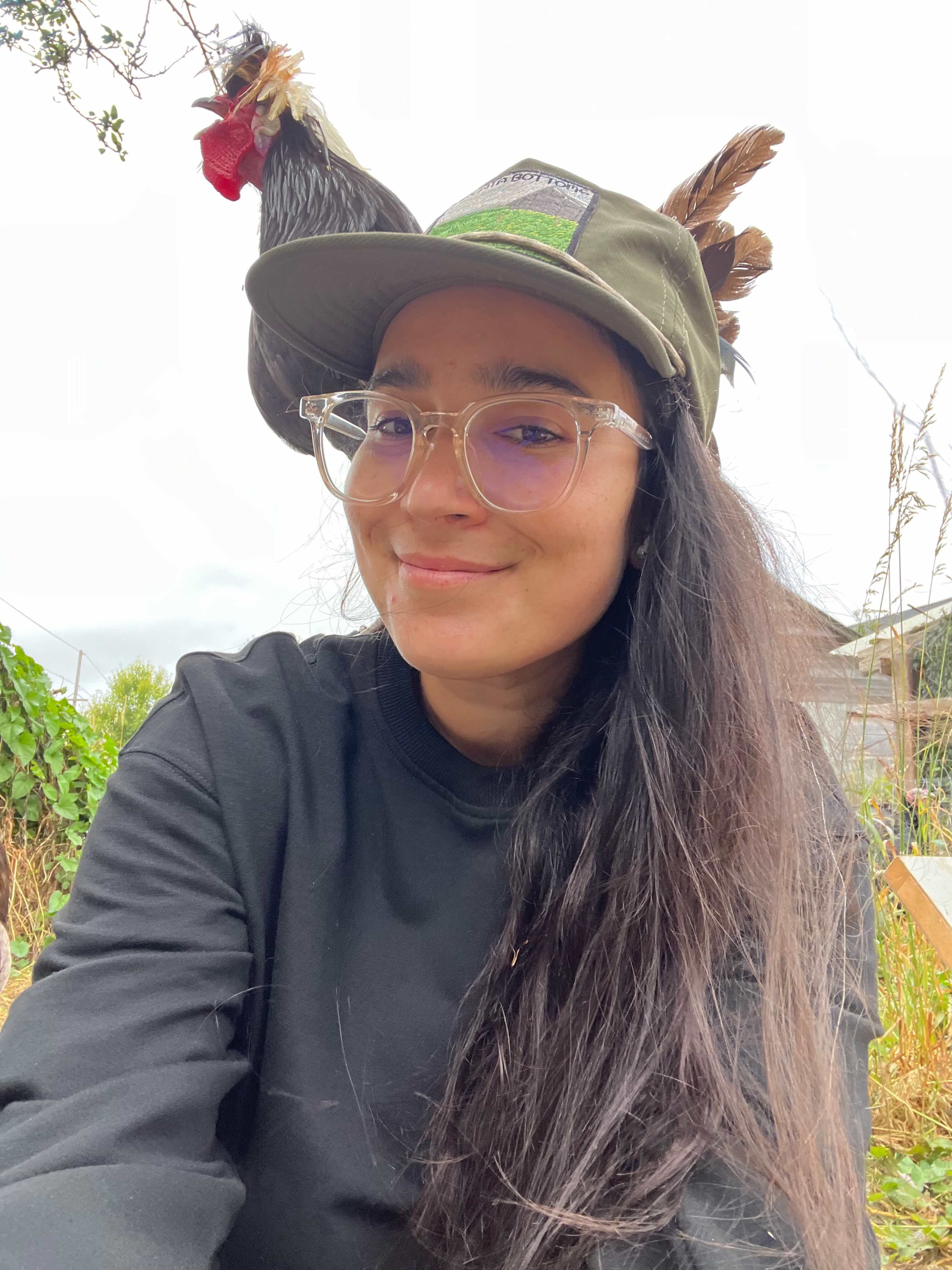 Woman with a rooster on her shoulder