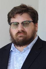 Alex Copeland headshot