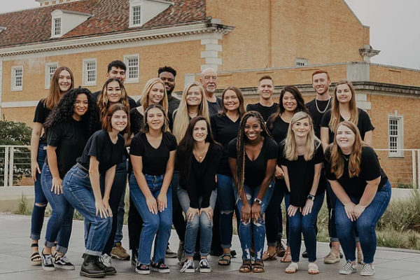 Swoop Group posing on campus