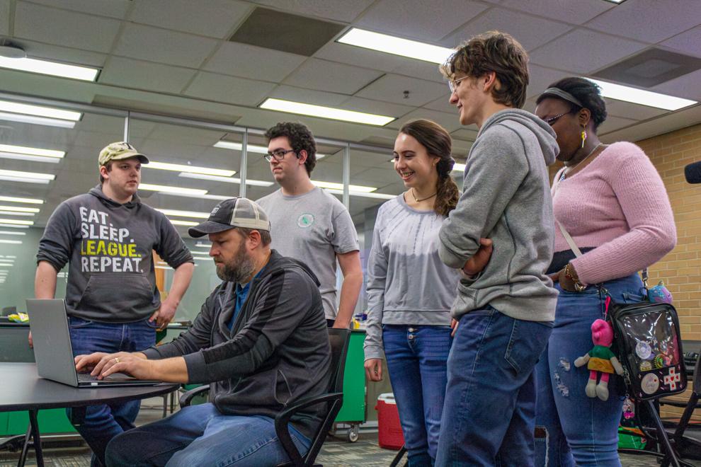 Associate professor of practice and co-organizer Gabriel Olson plays "Demon Punter" with the developer team on Jan. 26, 2025. Photo by JC Ramirez  