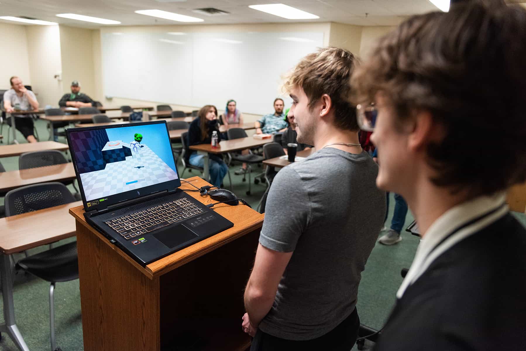 Students presenting their games in the Pipeline capstone course. 