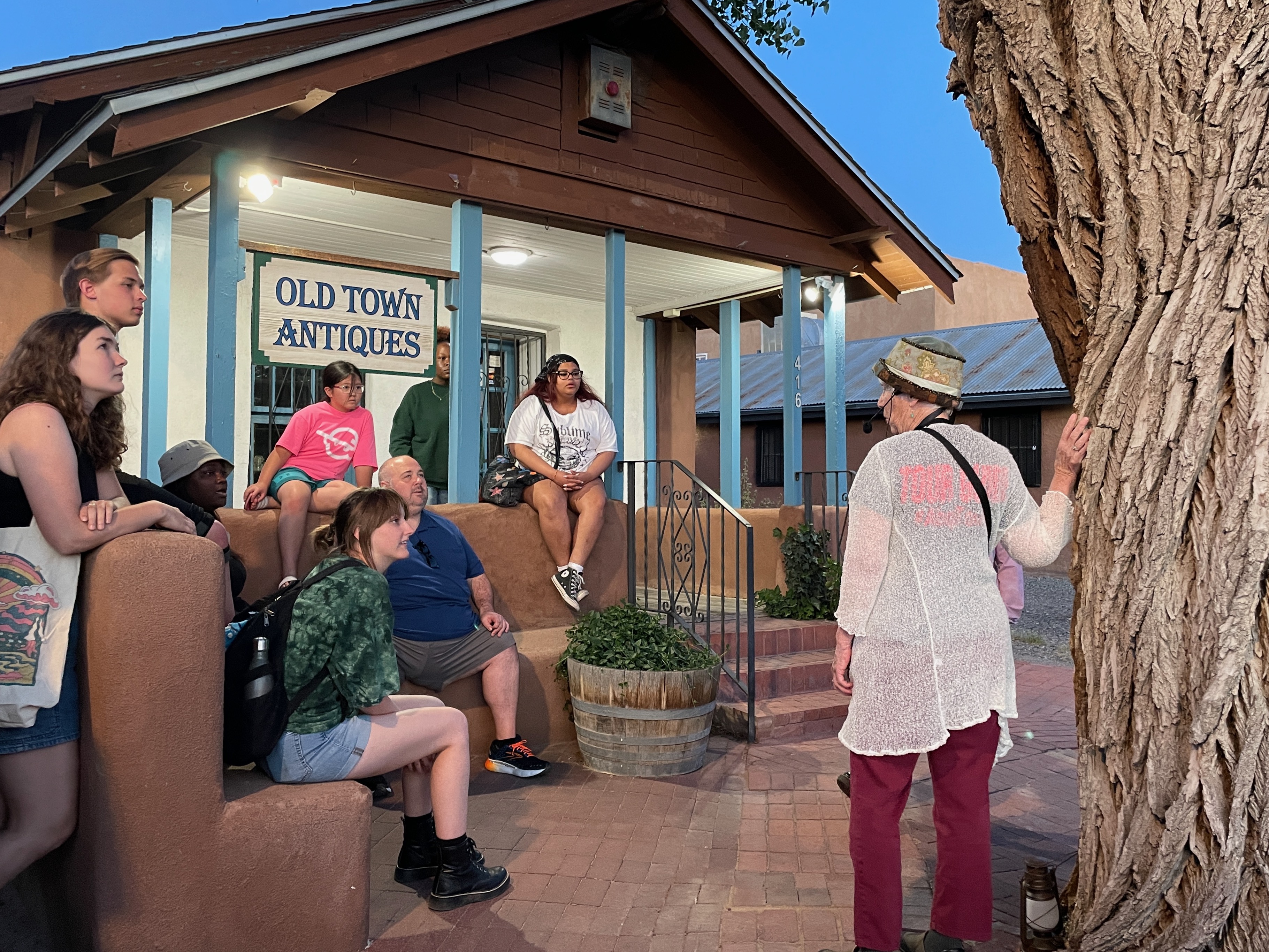 Students having class in an old west set. 